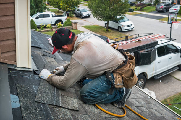 Professional Roof Replacement technician working in Yoder, CO